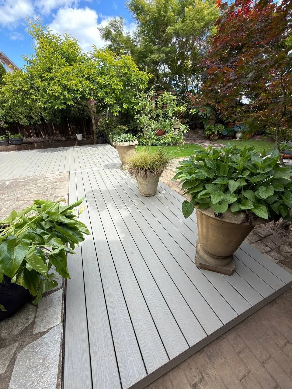 Composite deck in a garden setting