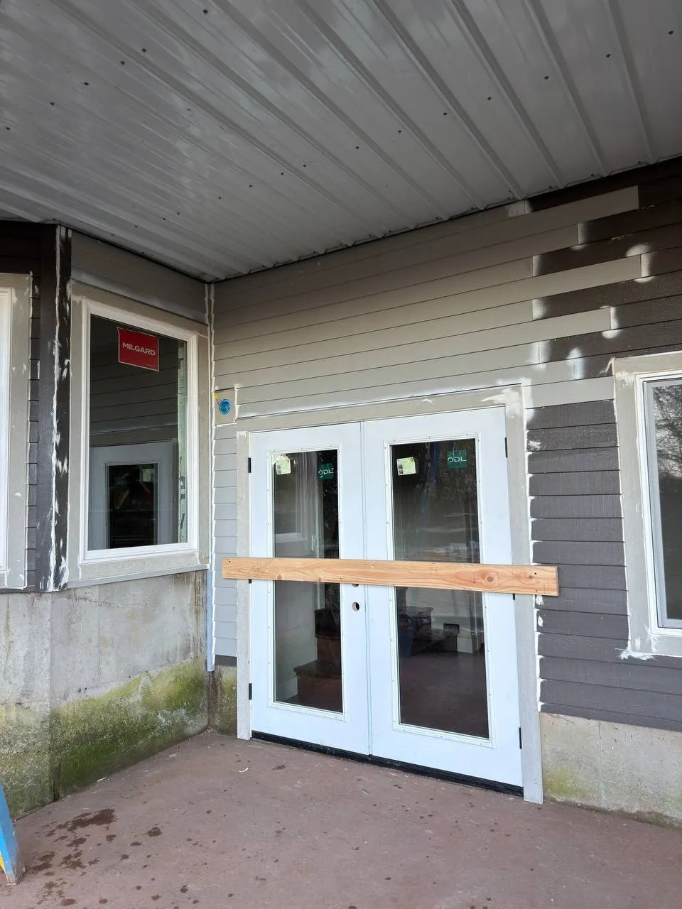 French patio doors installed in a lower-level wall
