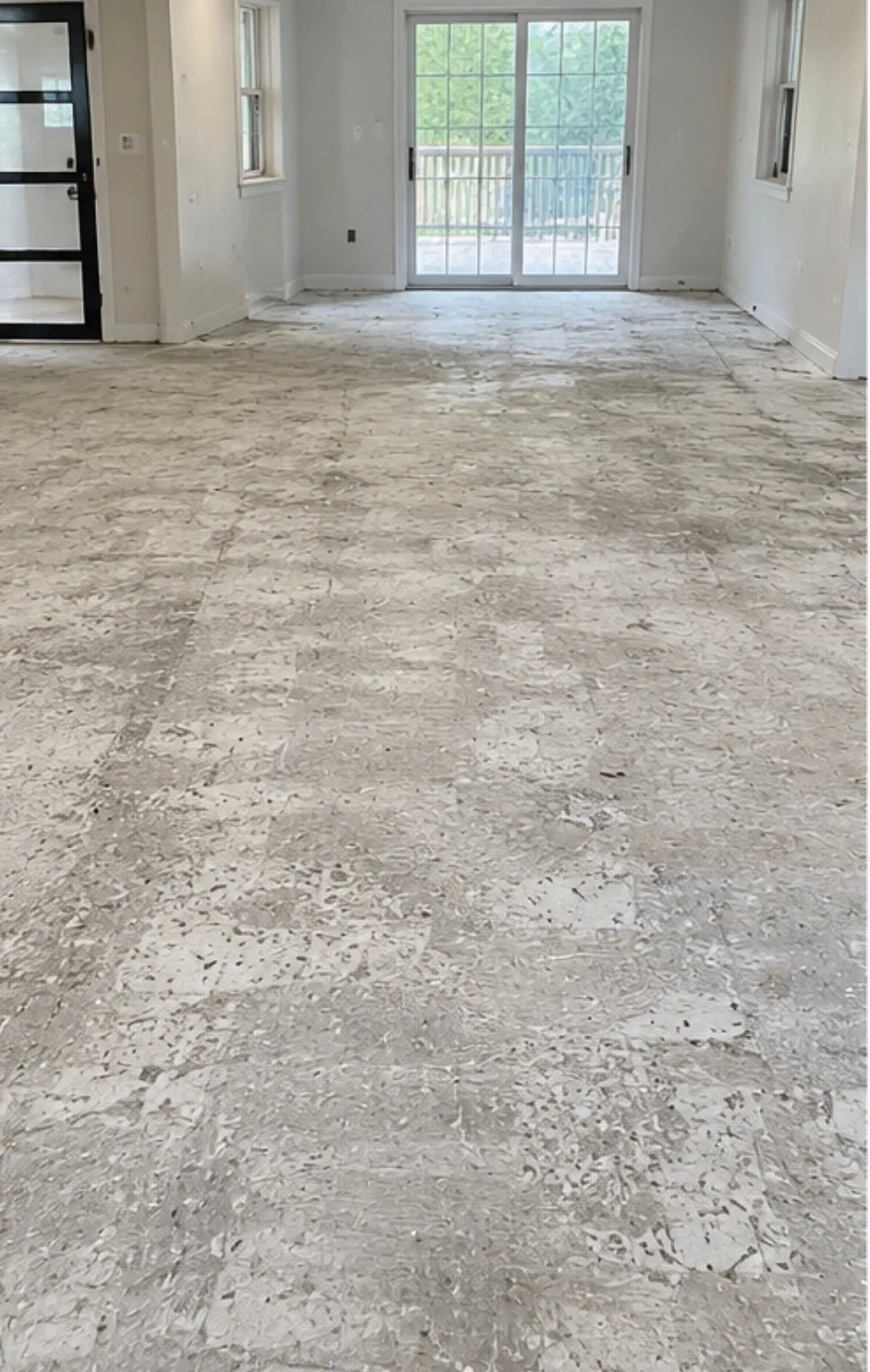 Scraped concrete floor ready for new flooring